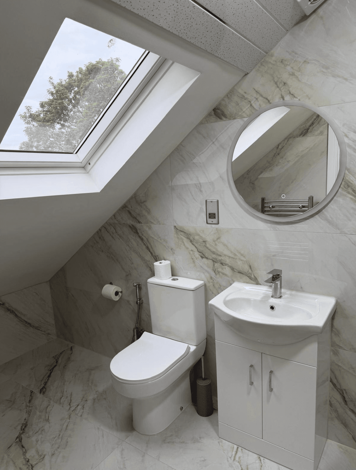 Loft bathroom — skylight toilet view