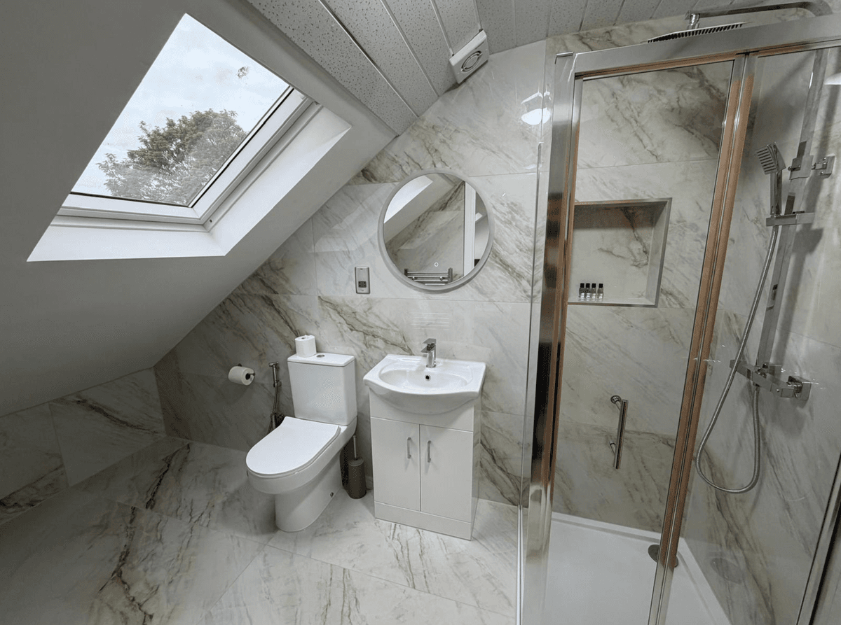 Loft bathroom — wide angle