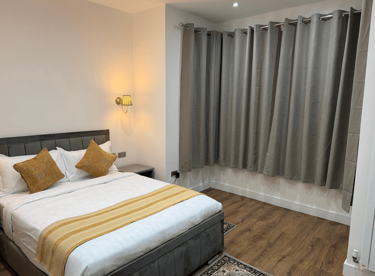 Bedroom with grey curtains